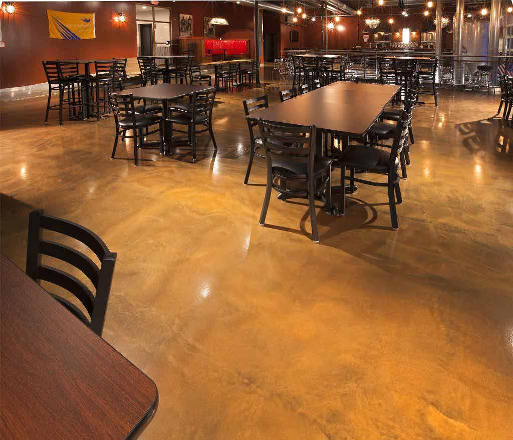 commercial concrete floor coating in brewery with tables and chairs